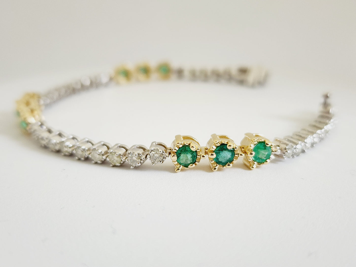 Natural Emerald and Diamond Tennis Bracelet in 14 Karat Two-Tone Gold – 7 Inches