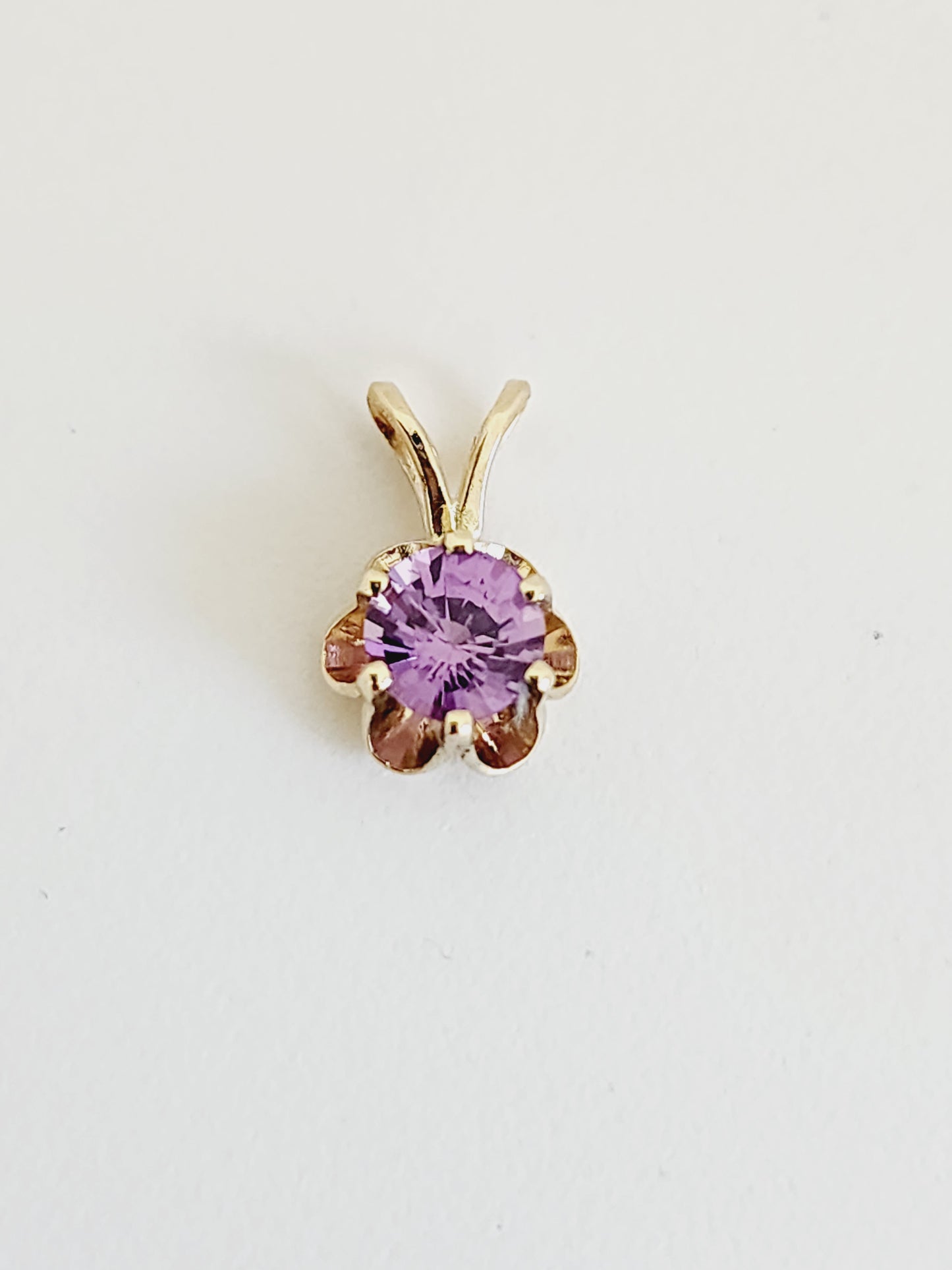 0.56 Carat Purple Sapphire Pendant 14 Karat Yellow Gold