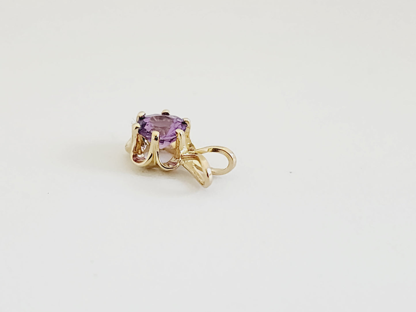 0.56 Carat Purple Sapphire Pendant 14 Karat Yellow Gold