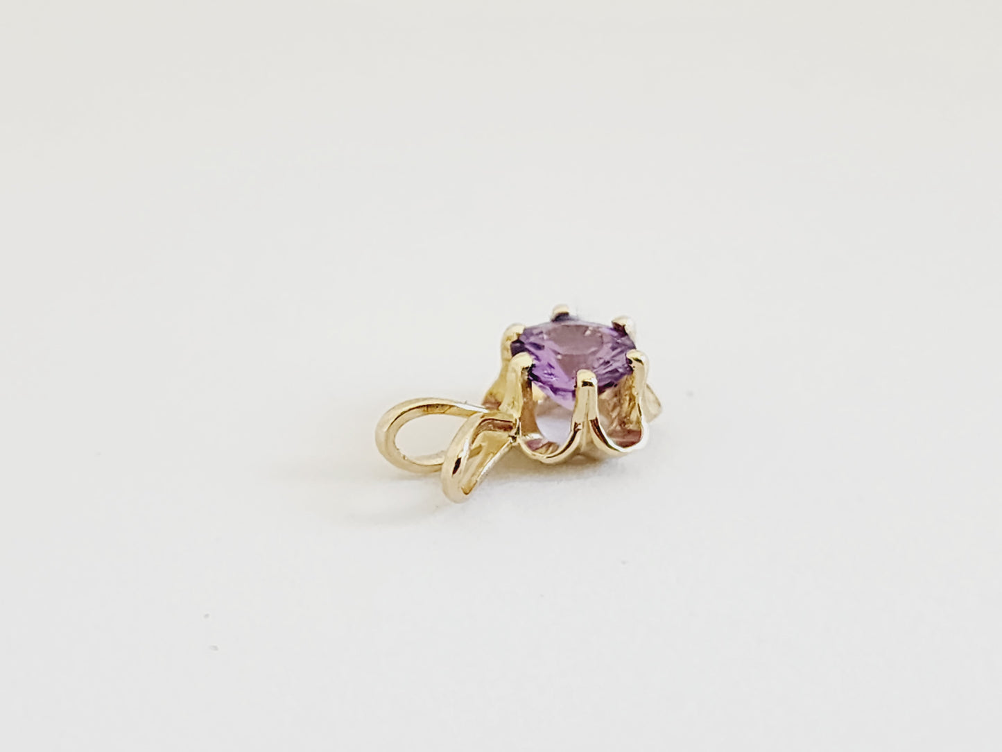 0.56 Carat Purple Sapphire Pendant 14 Karat Yellow Gold