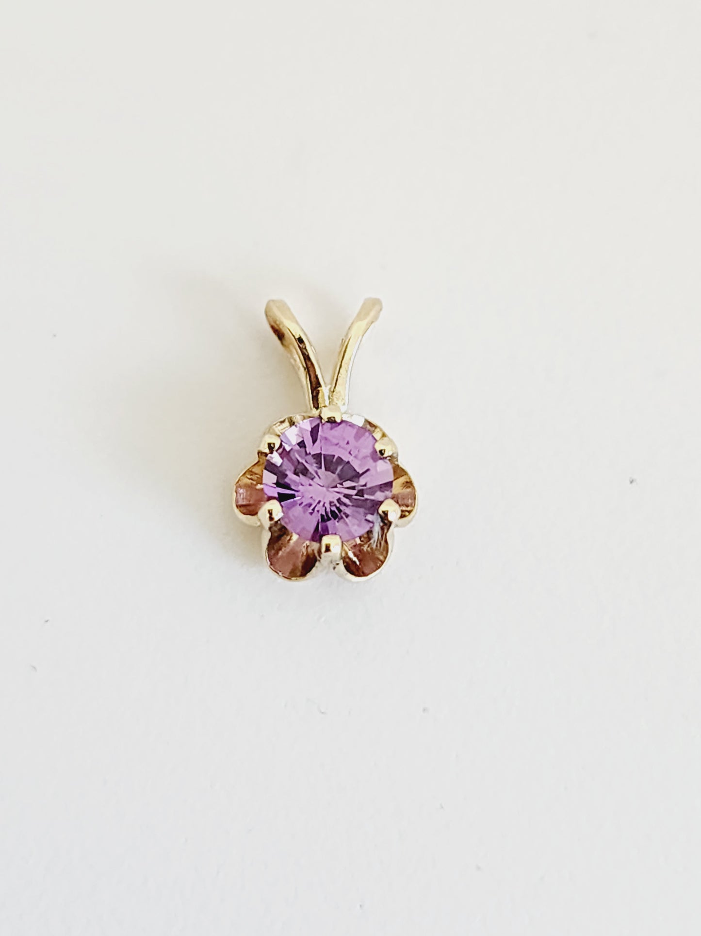 0.56 Carat Purple Sapphire Pendant 14 Karat Yellow Gold