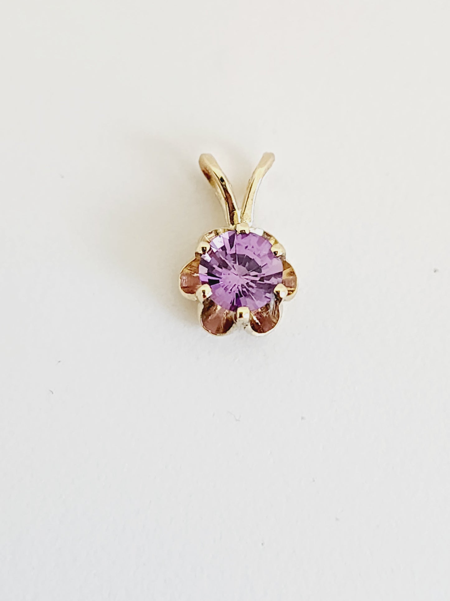 0.56 Carat Purple Sapphire Pendant 14 Karat Yellow Gold